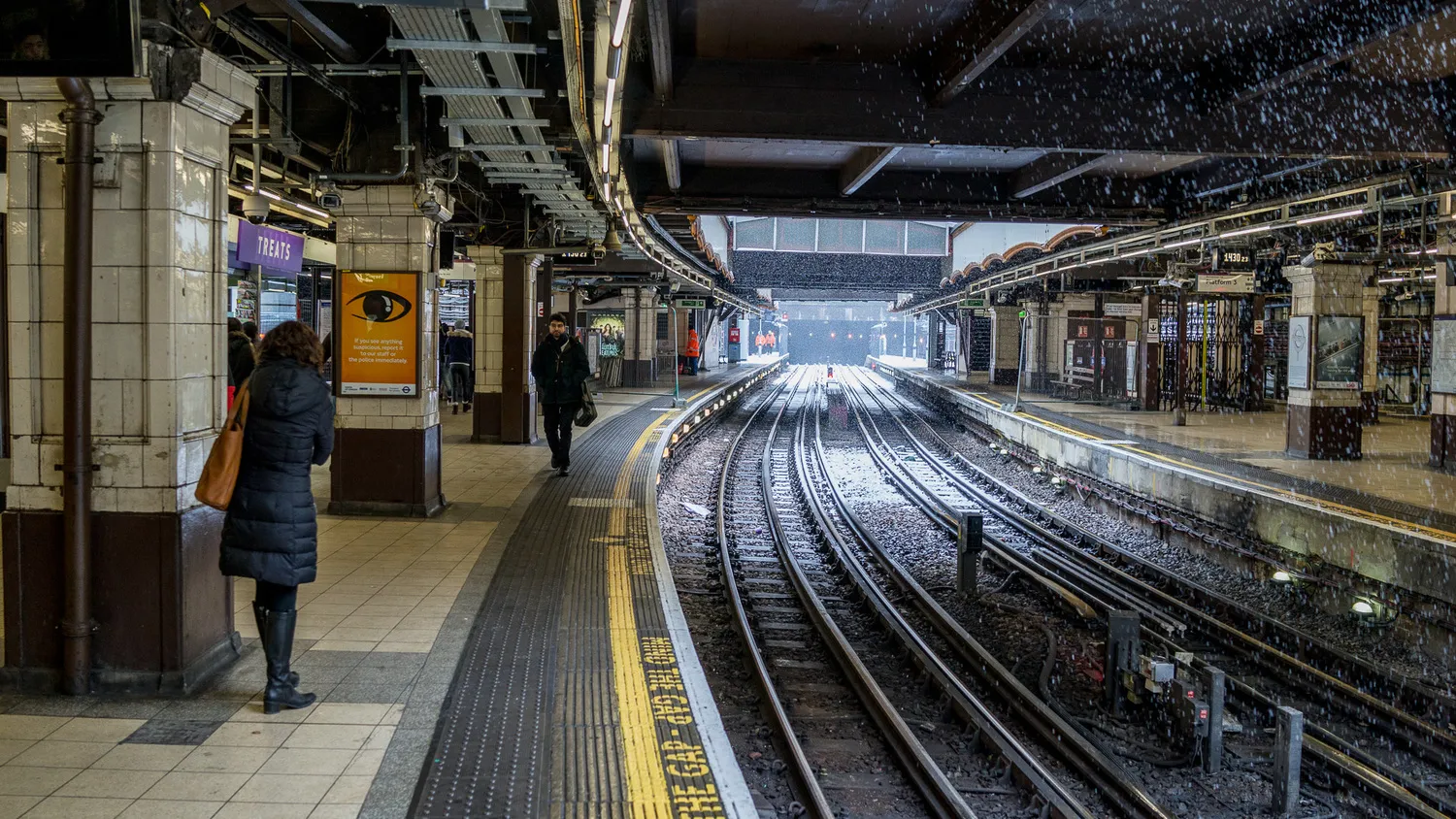 Snow falls on the tracks of the Metropolitan line at Baker Street Tube station in London