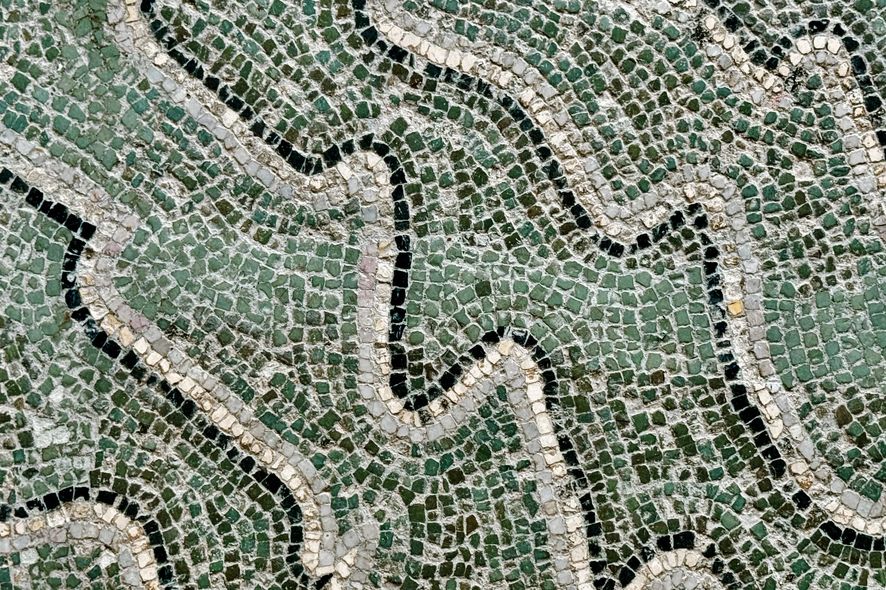 Abstract mosaic waves in blue, gold, and cream.